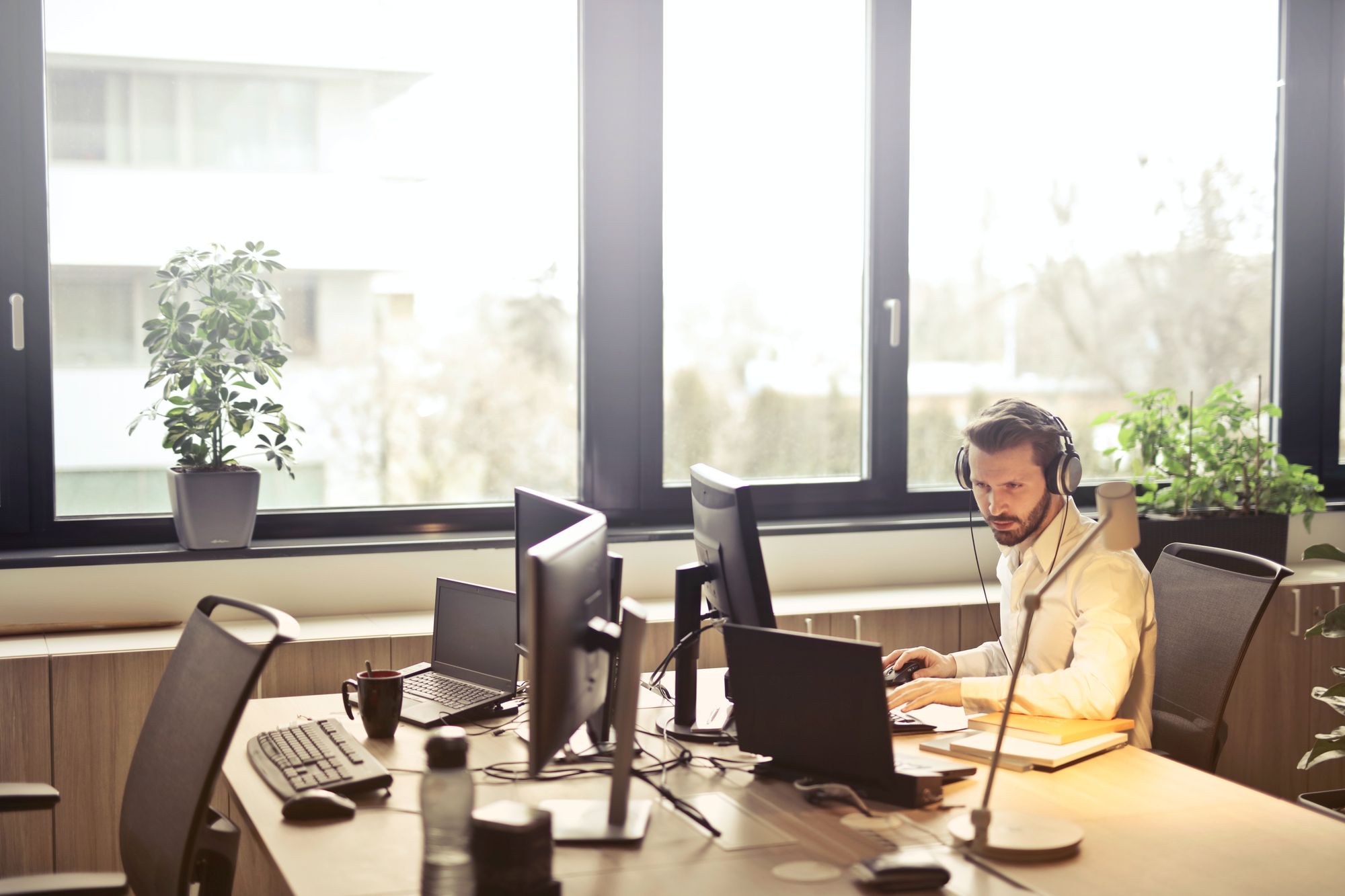 Man providing online customer service using live chat